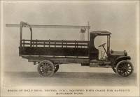 Truck of Bills Bros., Denver, Colo. (Colorado) equipped with crane for handling monument work.